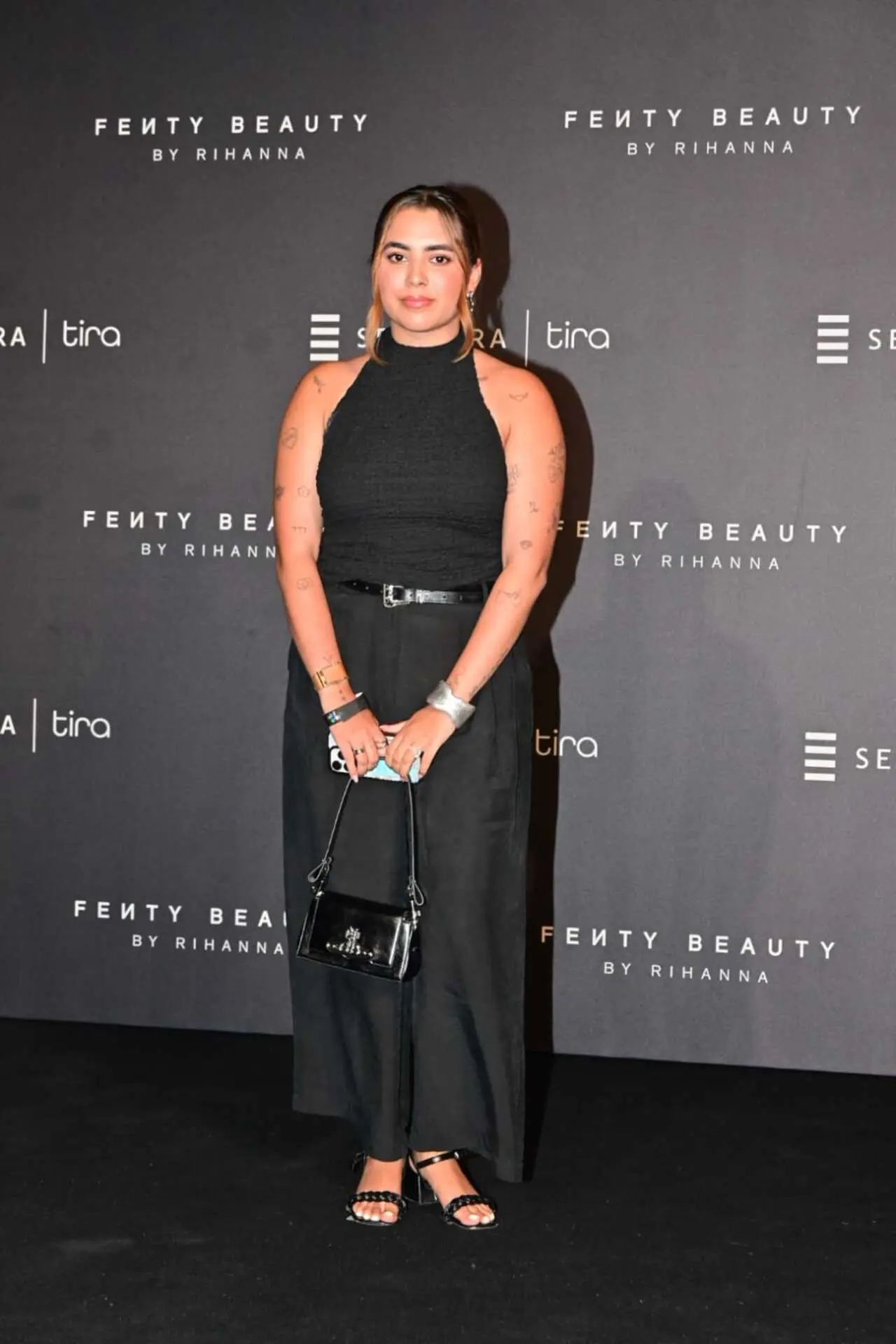 Aaliyah Kashyap was seen at the event in an all-black halter-neck ensemble.